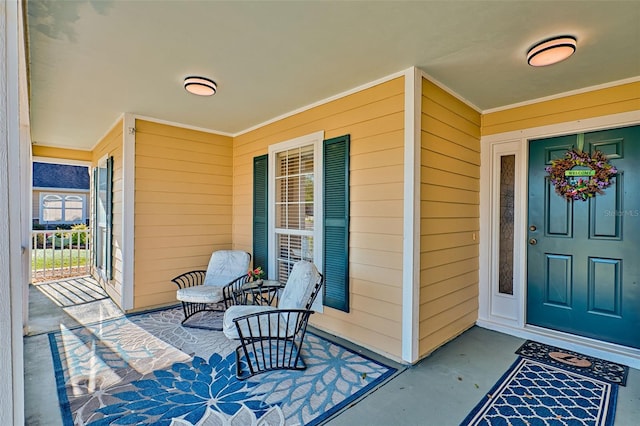 property entrance featuring covered porch