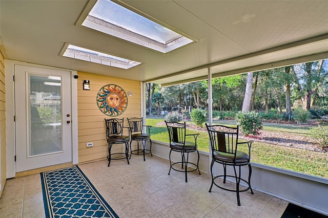 sunroom with a skylight