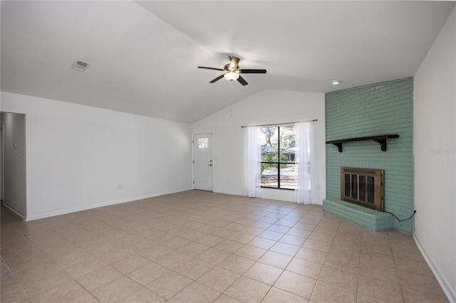 unfurnished living room with visible vents, a brick fireplace, vaulted ceiling, light tile patterned flooring, and a ceiling fan