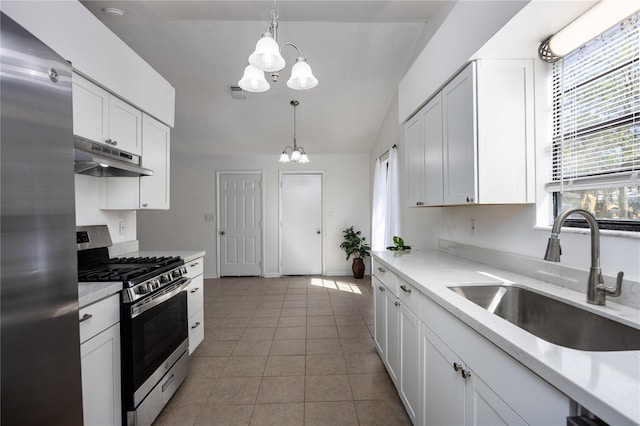 kitchen featuring a sink, stainless steel appliances, light countertops, under cabinet range hood, and a chandelier