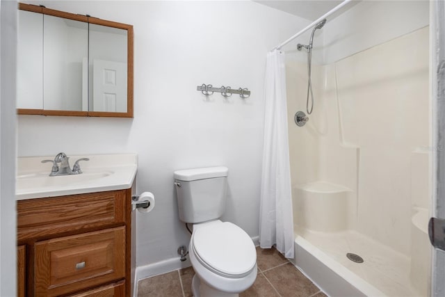 bathroom with a shower with curtain, tile patterned floors, toilet, and vanity