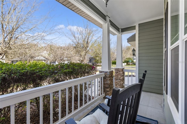 balcony featuring a porch