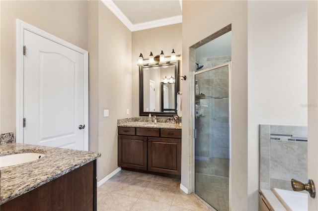 bathroom featuring a sink, a stall shower, two vanities, and ornamental molding