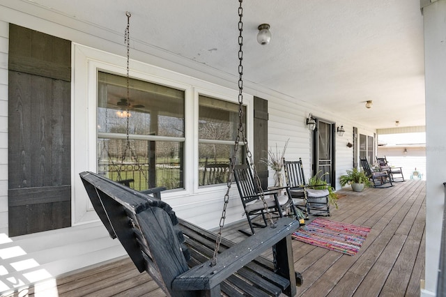 wooden terrace with covered porch