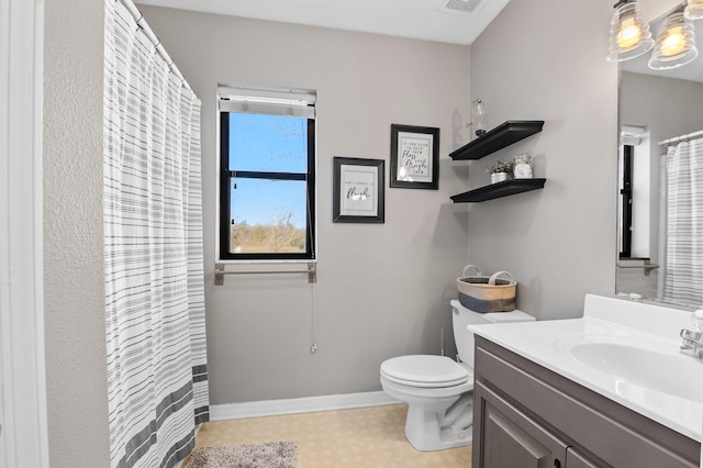 full bath featuring tile patterned floors, visible vents, toilet, baseboards, and vanity