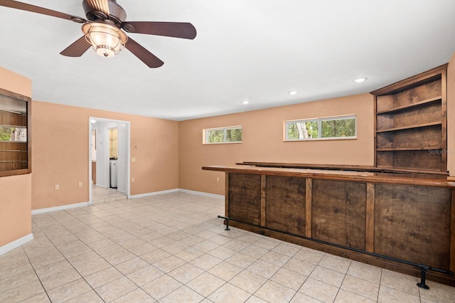 interior space featuring light tile patterned floors, recessed lighting, baseboards, and ceiling fan