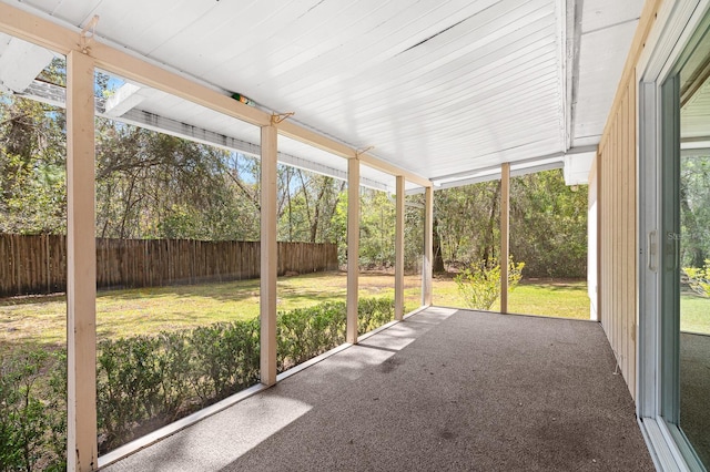 unfurnished sunroom featuring a healthy amount of sunlight