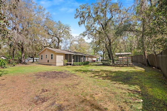 view of yard featuring fence