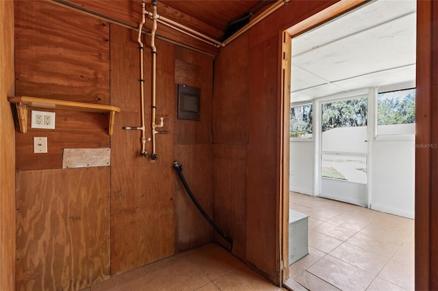 corridor with light tile patterned floors