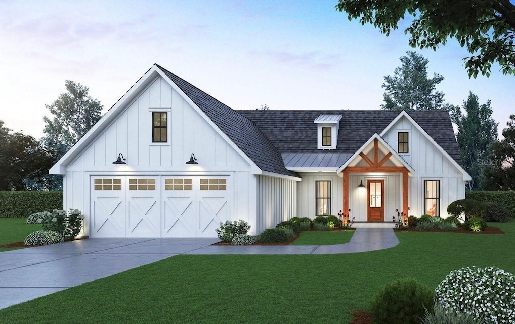 modern farmhouse with a garage, board and batten siding, concrete driveway, and a front yard