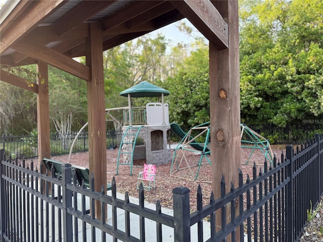 community jungle gym with fence