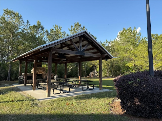 view of home's community with a gazebo and a lawn