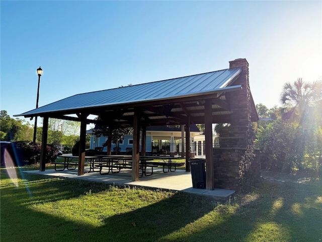 view of community with a gazebo and a lawn