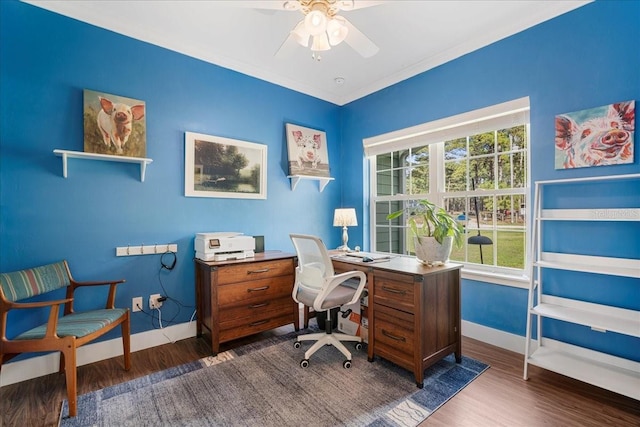 office area with baseboards, ceiling fan, and dark wood-style flooring