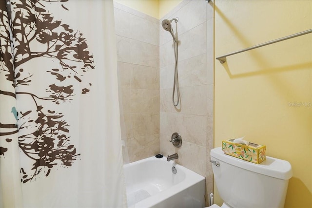 full bathroom with toilet and shower / tub combo with curtain