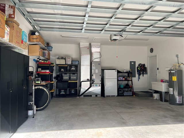 garage with a garage door opener, water heater, and freestanding refrigerator