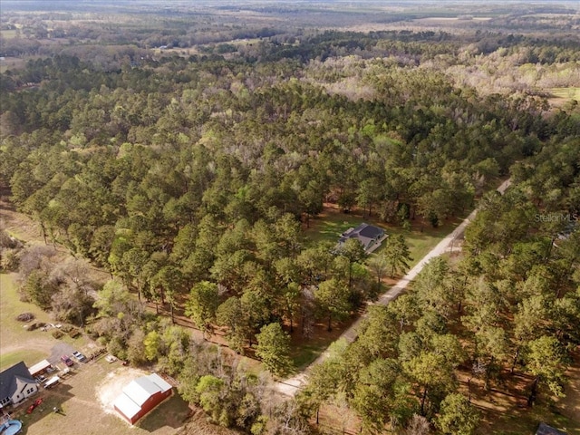 bird's eye view with a view of trees