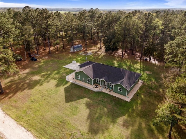 aerial view featuring a forest view