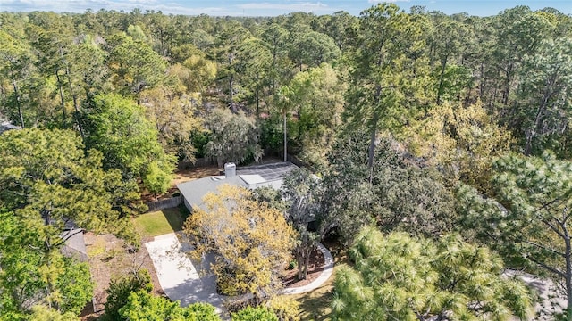 drone / aerial view with a view of trees