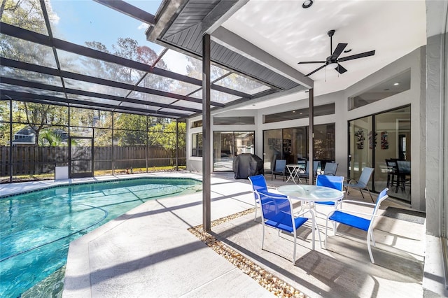 view of swimming pool with a patio area, a fenced in pool, and fence