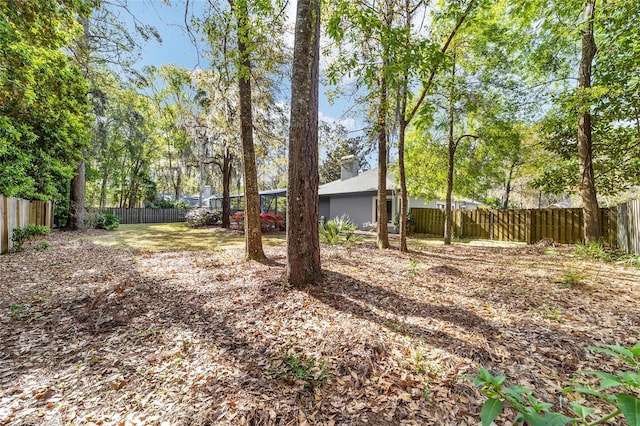 view of yard featuring a fenced backyard