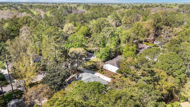 bird's eye view featuring a view of trees