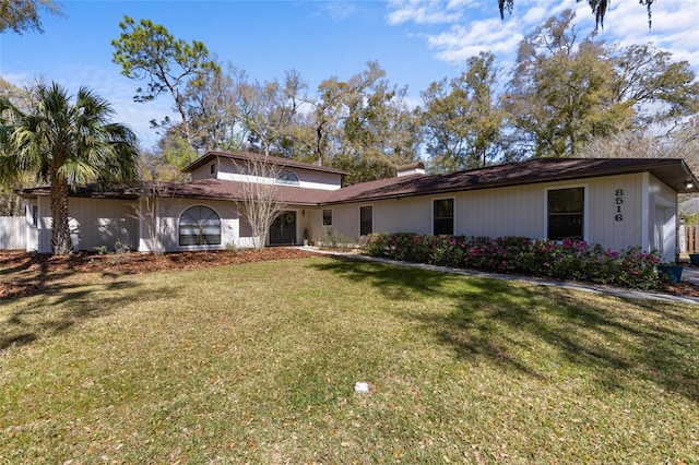 view of front of house with a front lawn