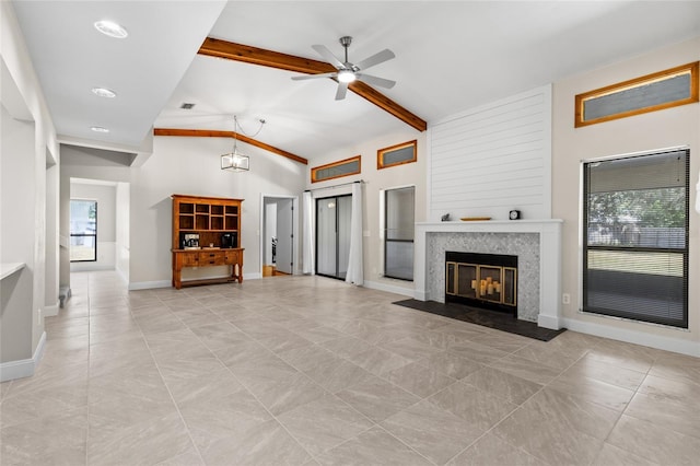 unfurnished living room with a ceiling fan, visible vents, baseboards, vaulted ceiling with beams, and a fireplace with flush hearth