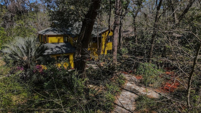 exterior space with a forest view