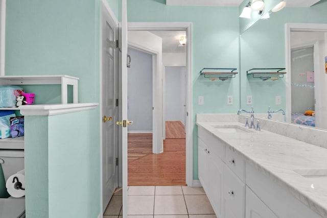 1132 SW 105th Ter, Gainesville, FL 32607 - full bath with double vanity and tile patterned flooring