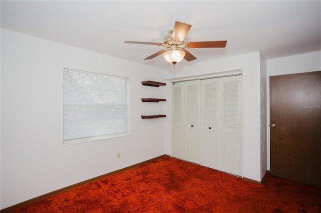 unfurnished bedroom featuring a closet, ceiling fan, baseboards, and carpet floors