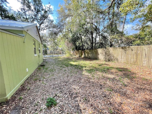 view of yard featuring fence