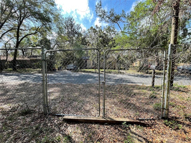 view of yard with a gate and fence