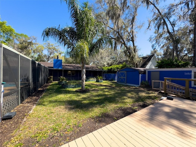 460 SE 4th Ave, Melrose, FL 32666 - view of yard with a shed, a wooden deck, an outdoor structure, and glass enclosure