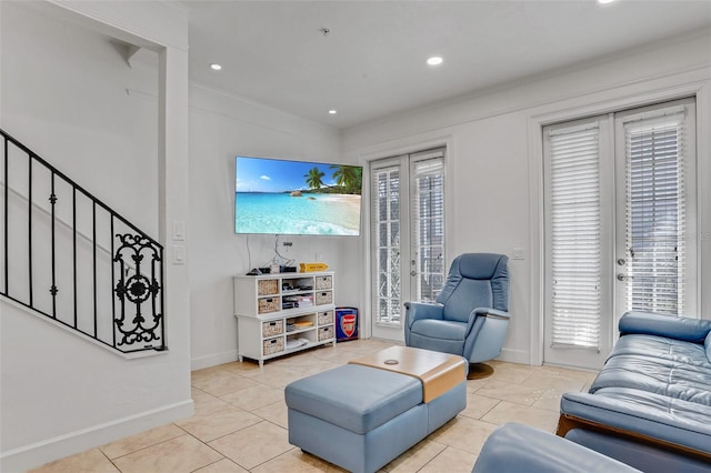 living area with stairway, baseboards, recessed lighting, ornamental molding, and tile patterned floors