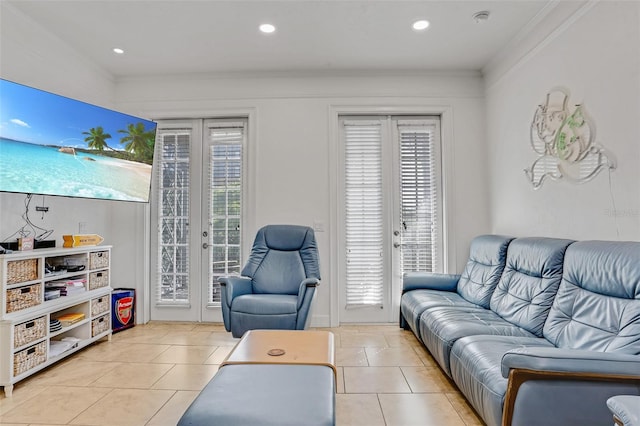 tiled living room with crown molding, recessed lighting, a healthy amount of sunlight, and french doors