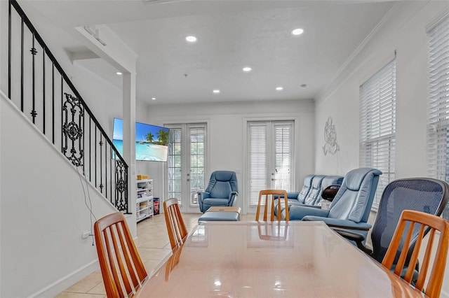 dining space featuring crown molding, stairway, light tile patterned floors, recessed lighting, and french doors