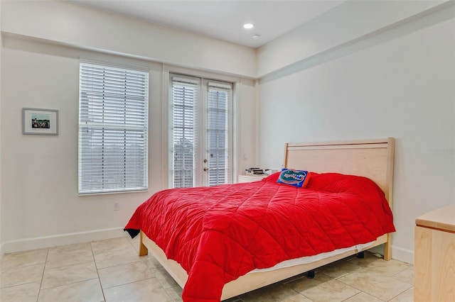 tiled bedroom with access to exterior, recessed lighting, and baseboards