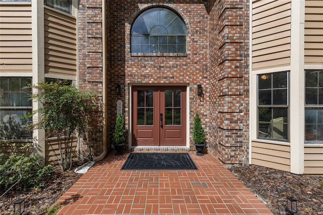 1118 SW 112th St, Gainesville, FL 32607 - entrance to property featuring french doors and brick siding