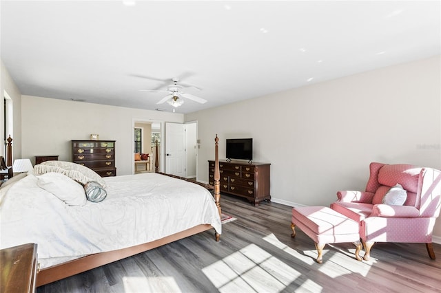 1118 SW 112th St, Gainesville, FL 32607 - bedroom with ceiling fan, baseboards, and wood finished floors