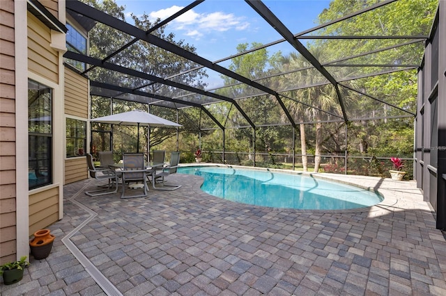 1118 SW 112th St, Gainesville, FL 32607 - outdoor pool with a patio and a lanai