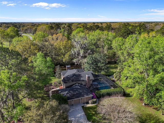 1118 SW 112th St, Gainesville, FL 32607 - drone / aerial view featuring a wooded view