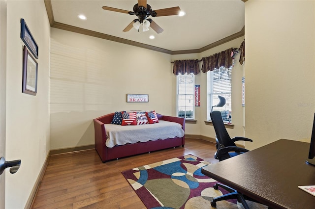 bedroom featuring ornamental molding, recessed lighting, wood-type flooring, baseboards, and ceiling fan