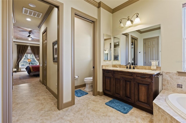 full bathroom featuring tile patterned flooring, visible vents, crown molding, tiled tub, and toilet