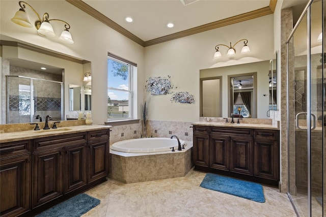 full bath featuring a shower stall, ornamental molding, two vanities, a bath, and a sink