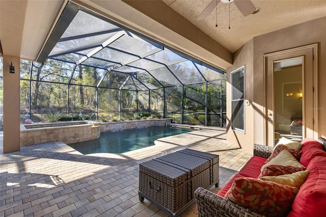 view of patio featuring a ceiling fan, an outdoor living space, glass enclosure, an outdoor pool, and an in ground hot tub