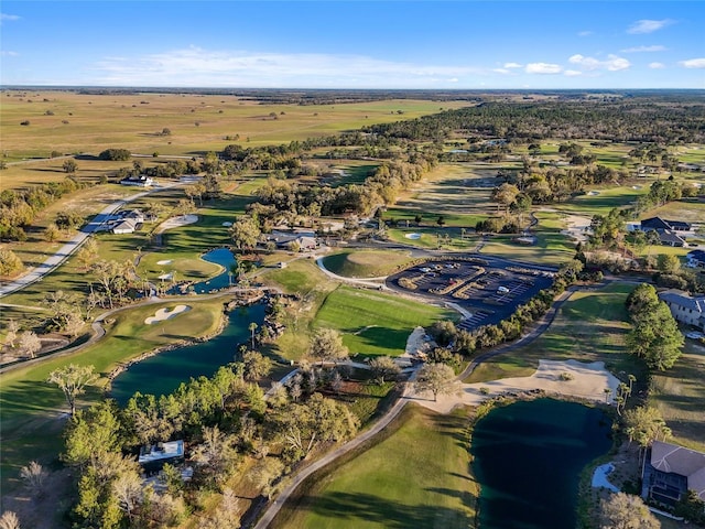 birds eye view of property with golf course view
