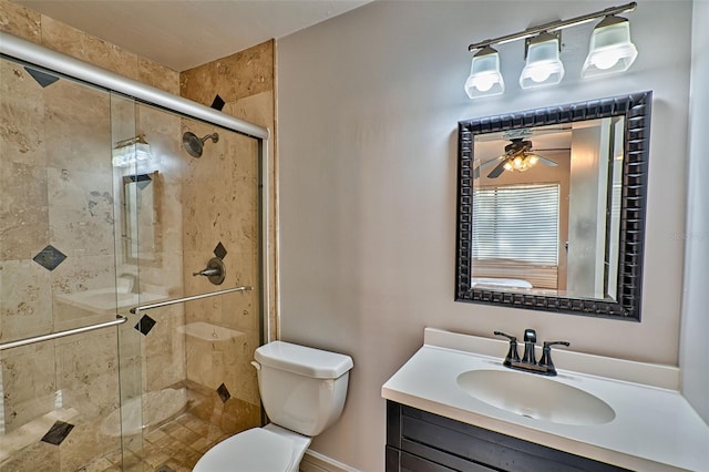 2635 SW 35th Pl Unit 2006, Gainesville, FL 32608 - full bath featuring a stall shower, toilet, vanity, and a ceiling fan