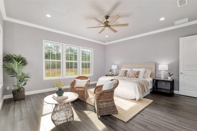 bedroom featuring baseboards, dark wood-style flooring, ornamental molding, and visible vents