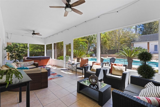 exterior space with a jacuzzi, tile patterned floors, an outdoor living space, and ceiling fan